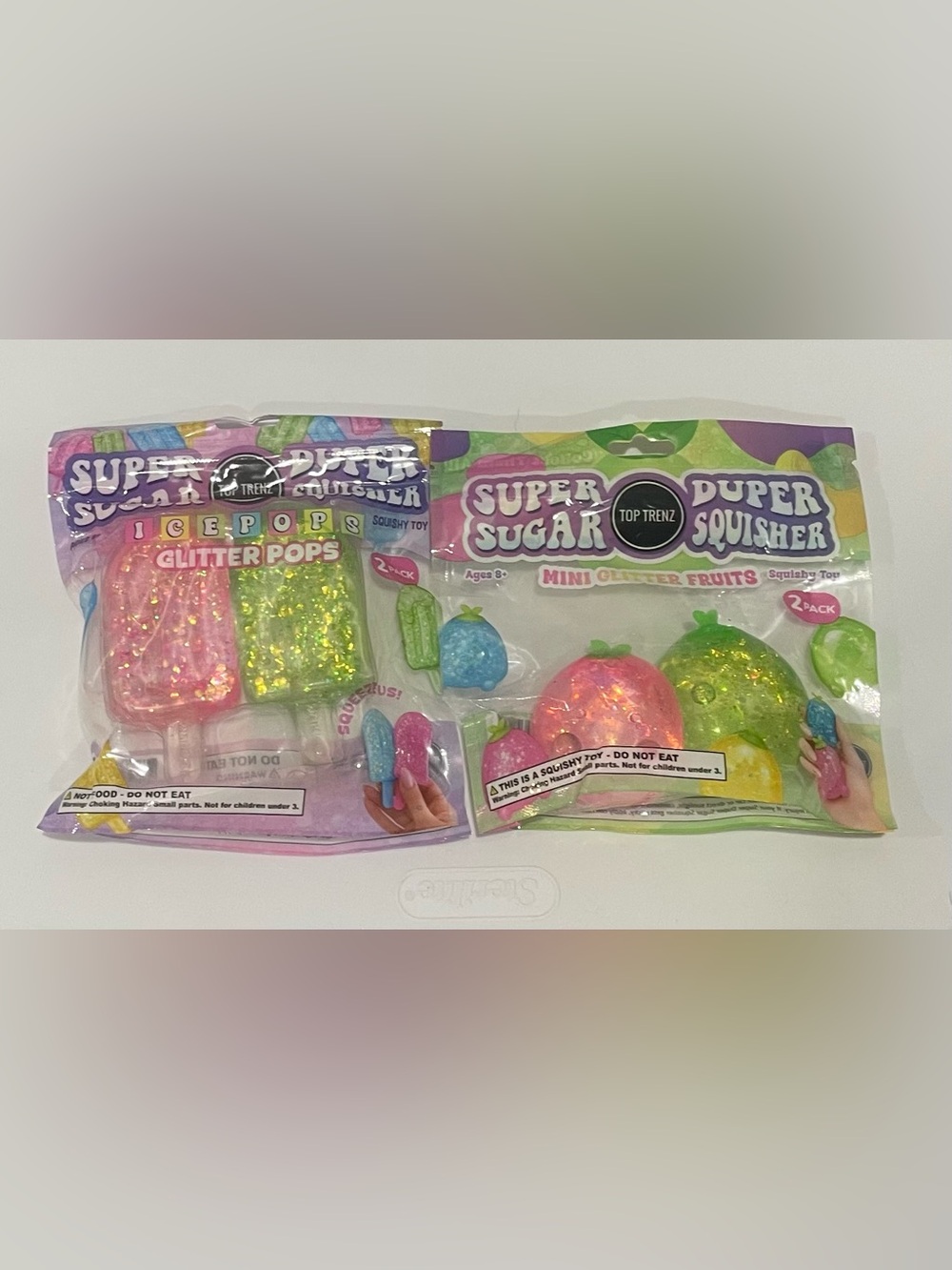 Top Trenz Super Sugar Pink & Green Glitter Pops and Super Squisher Fruits Pack